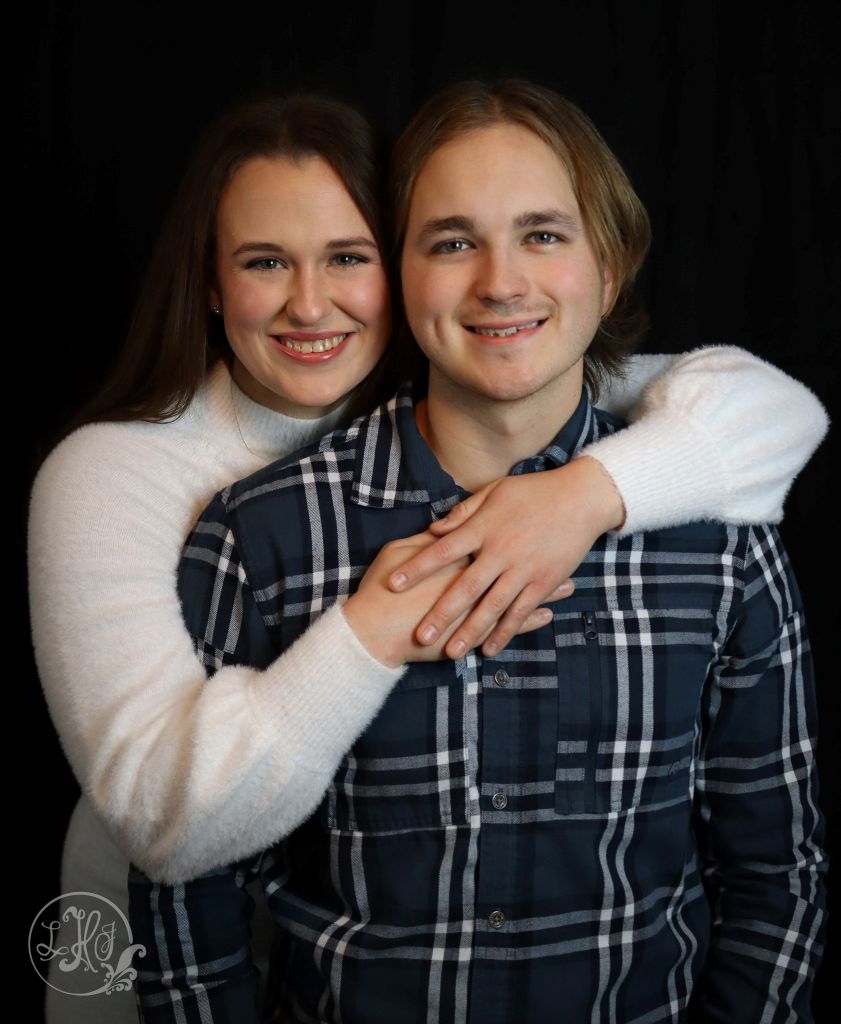 1/2 Couple portraits on black backdrop