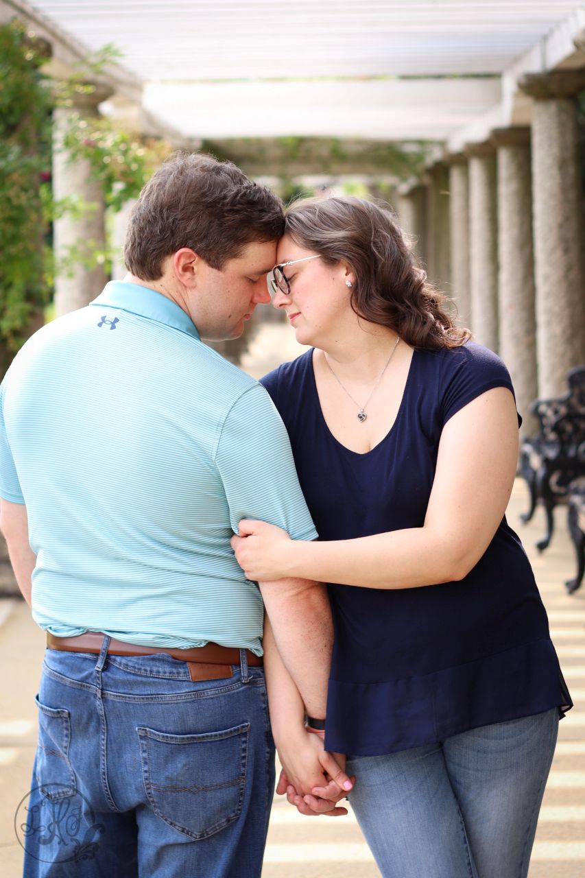 Couples 3/4 Portrait Forehead lean and arm hug