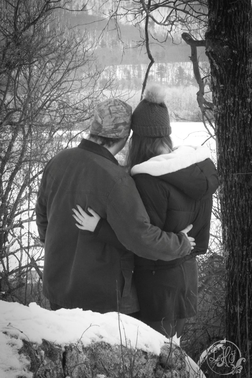 black and white photo of couple from behind