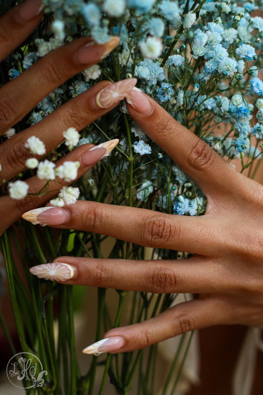 Detail photo of hands holding flowers